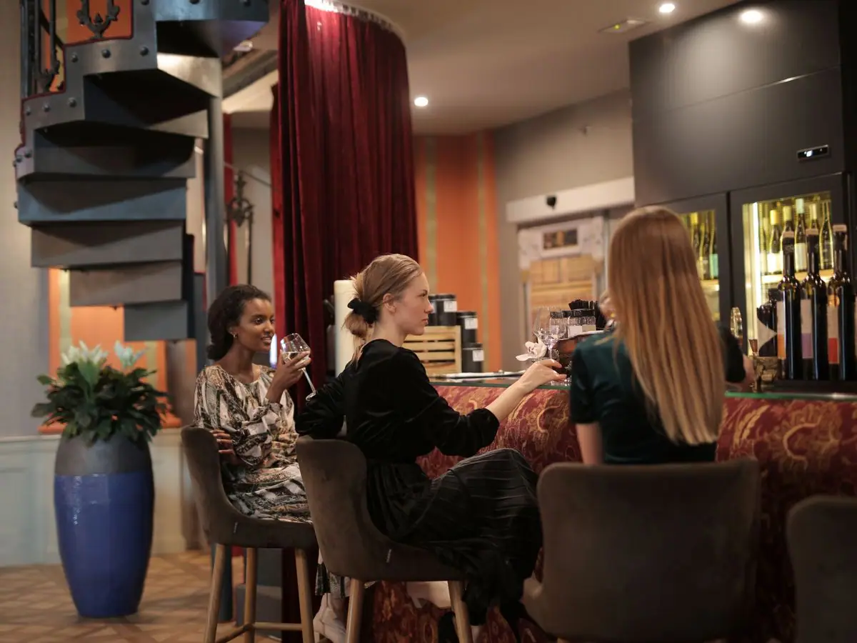 Guests mingling with cocktails at an upscale corporate networking event
